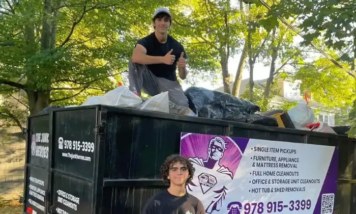 The Junk Heroes loading commercial junk into their truck